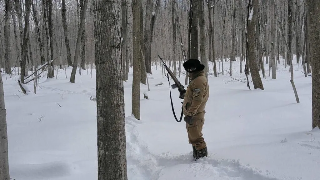 A U.S. Border Patrol Agent with an M14 rifle on the northern U.S. border