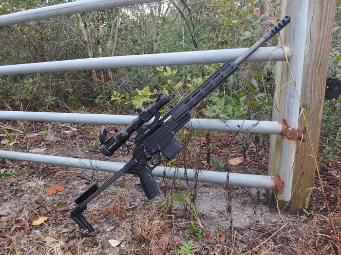 CZ 600 Trail leaned up against gate