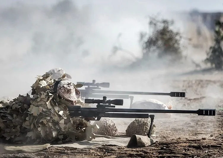 Iranian Navy sniper in a ghillie suit