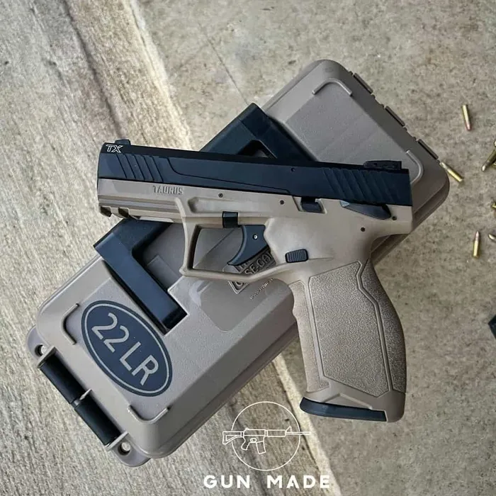Taurus TX22 sitting on ammo can