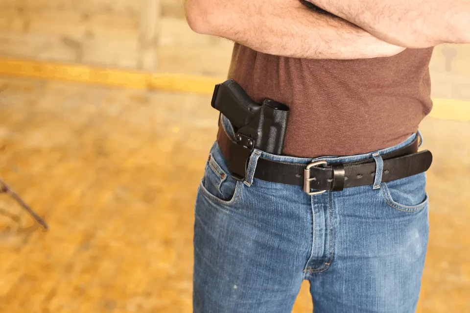 man conceal carrying pistol