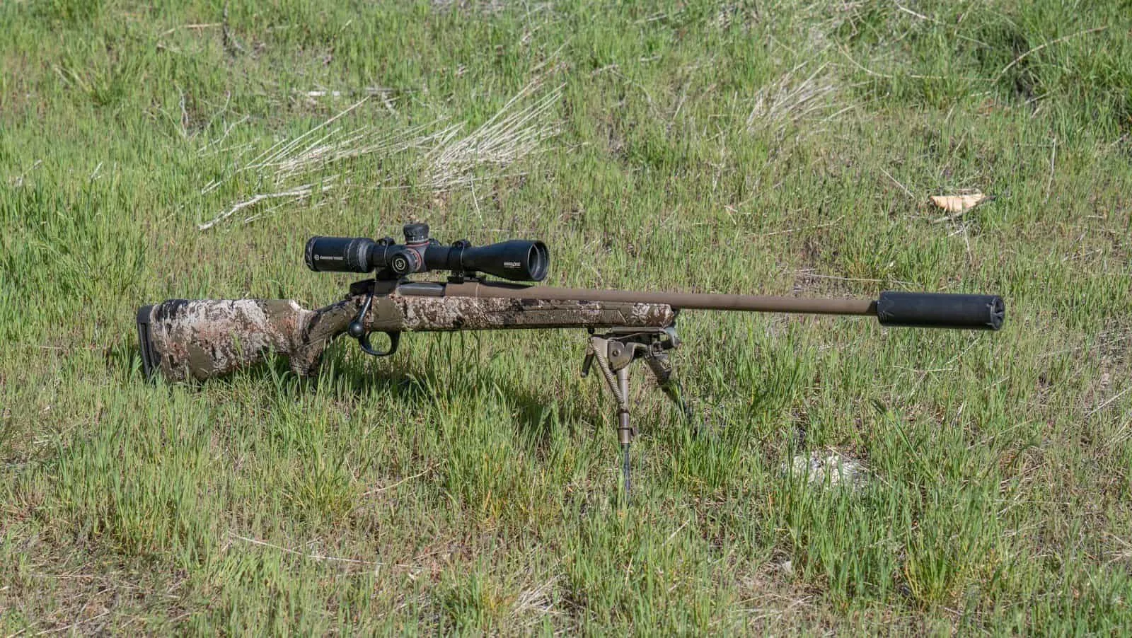 cva cascade 350 legend side view with crimson trace optic and silencer