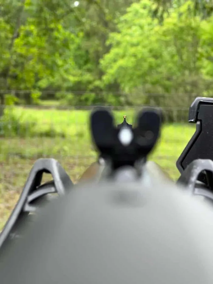 henry big boy steel 357 magnum sighted in POV with field as background