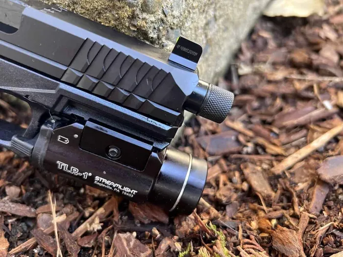 polymer80 pfc9 threaded barrel and close up with tlr-1