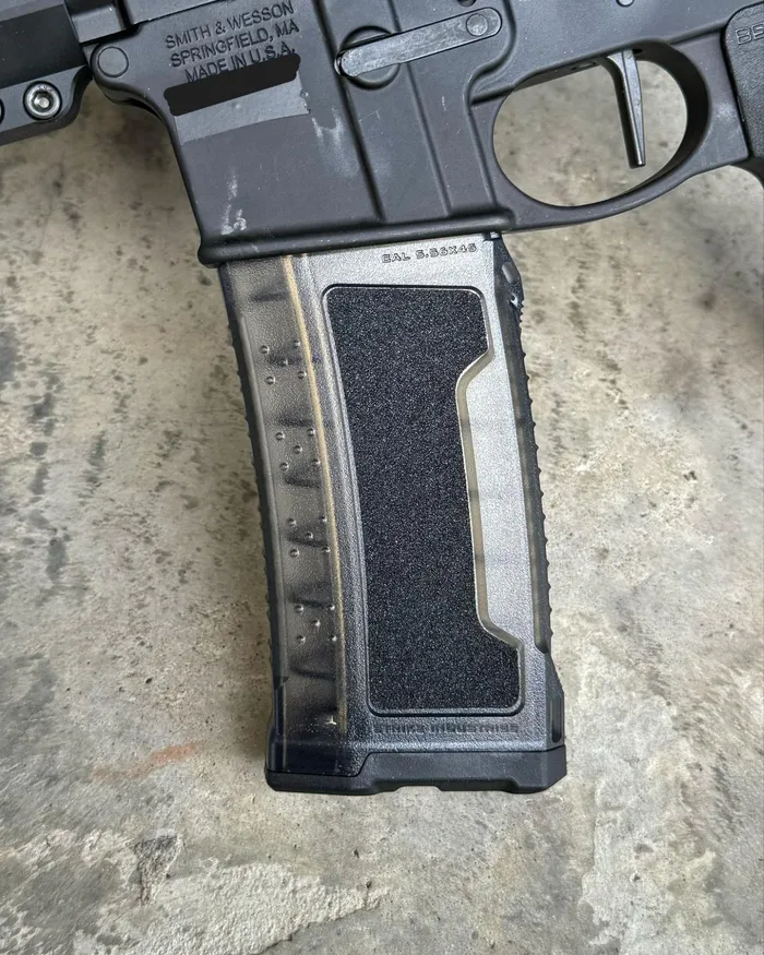 Close-up of the Strike AR-15 magazine, focusing on the over-insertion stop feature that ensures proper seating in the firearm