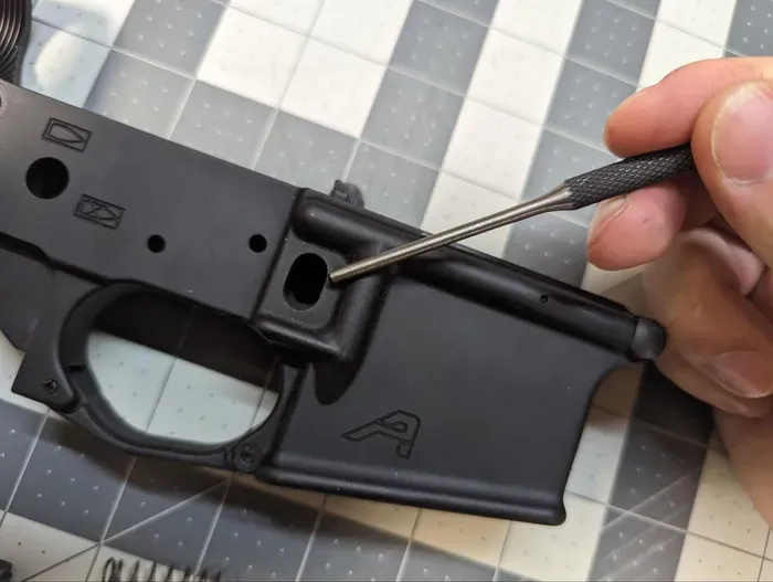 Install the Mag Release and Catch Assembly