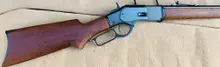 Winchester 1873 Sporter Rifle, .357 Mag/.38 SPL, 24" Octagon Barrel, 14RD, Polished Blued, Right Hand, Oil Walnut Pistol Grip