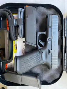 Glock G45 Gen5 9mm Compact Crossover Pistol with 4.02" Barrel, 17+1 Rounds, Fixed Sights, and Interchangeable Backstrap Grip - PA455S203